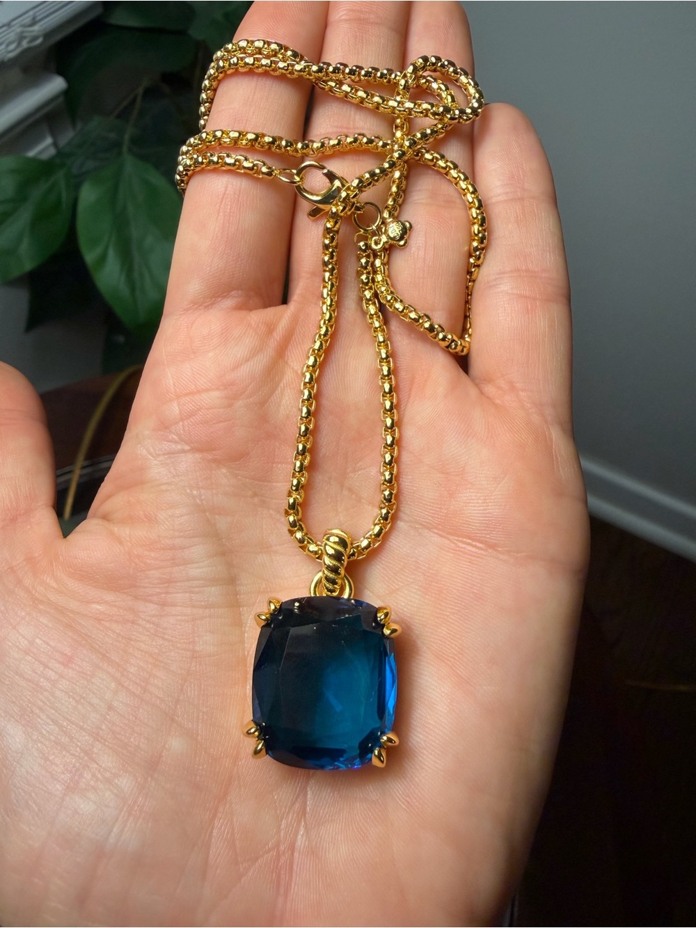 Gold-Tone Necklace with Deep Blue Faceted Pendant